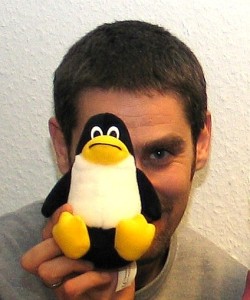 Balthas Seibold with open source penguin. Copyright: Balthas Seibold